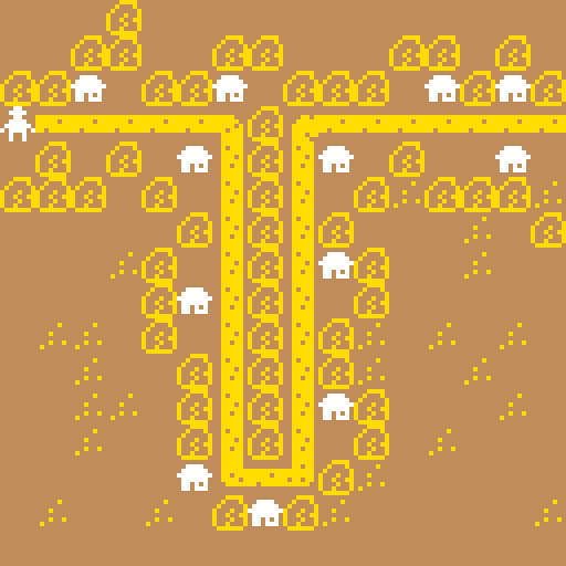 A human figure faces a long and winding yellow and brown desert road flanked by boulders and houses too close together for comfort.